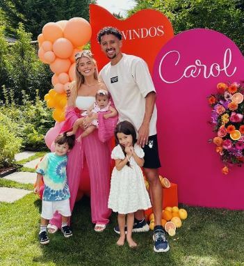 Carol Cabrino with her husband Marquinhos and children.